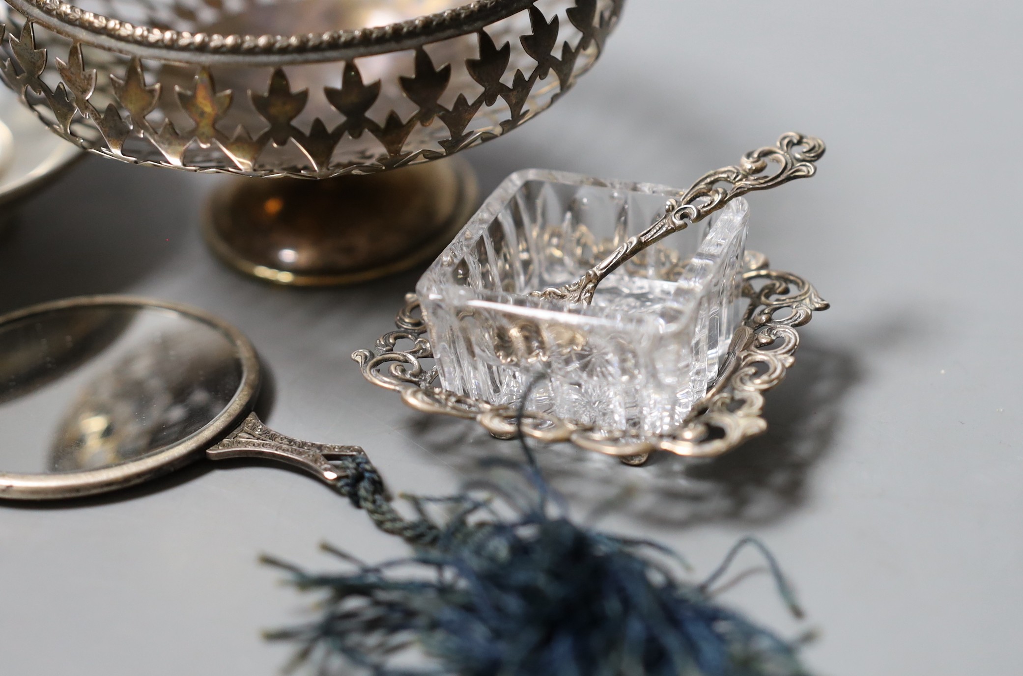 A cased Georgian silver and mother of pearl mounted campaign knife and fork, a pierced silver bonbon dish and other minor silver.